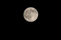 Full moon on black background in high resolution — Stock Photo