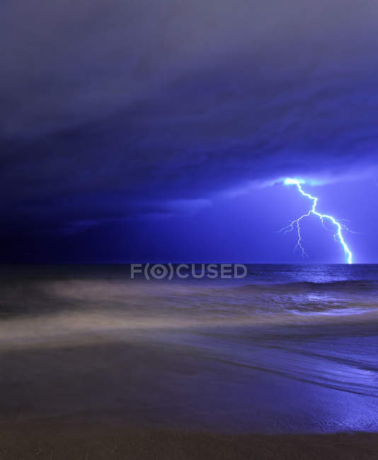 Bolt of lightning from approaching storm — Stock Photo