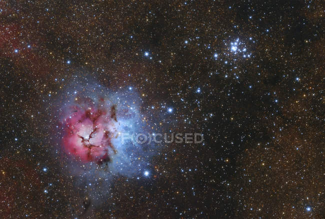Trifid Nebula and Messier 21 cluster in Sagittarius in high resolution — Stock Photo