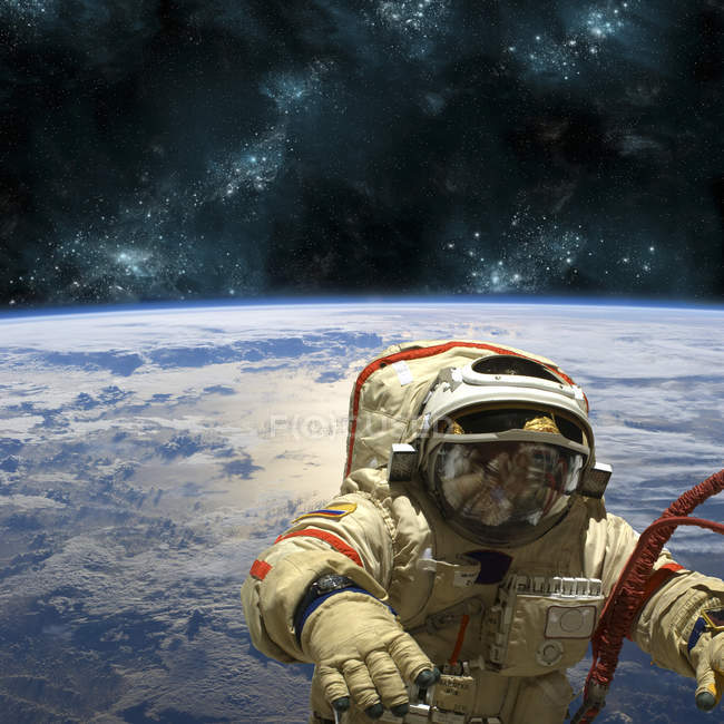 Cosmonauta che galleggia nello spazio sopra la Terra, stelle che brillano sullo sfondo — Foto stock