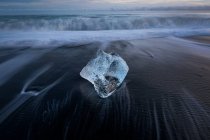 Ice cube on river shore, iceland. frozen lake baikal. russia. — Stock Photo