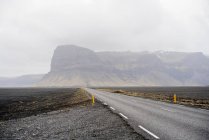 Empty road in east Iceland near Mt Lmagnpur — Stock Photo