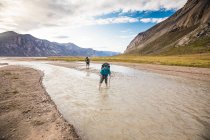 Male tourists in Baffin Mountains, Canada. — Stock Photo