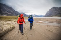 Male tourists in Baffin Mountains, Canada. — Stock Photo