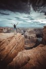 Woman in Horseshoe Bend point at sunset — Stock Photo