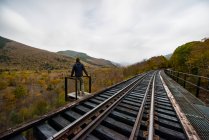 Abandoned Railroad Trestle high above New england autumn forest — Stock Photo