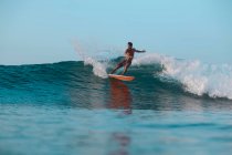 Surfer on a wave, Lombok, Indonesia — Stock Photo