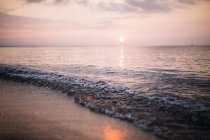 Beautiful sunset on the beach  on nature background — Stock Photo