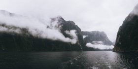 Panoramic view of Milford Sound fjord during foggy weather, New Zealand — Stock Photo