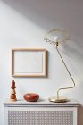 Modern interior with wooden frame and lamp — Stock Photo