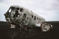 Closeup shot of Solheimasandur plane wreck DC-3 on black sand beach — Stock Photo