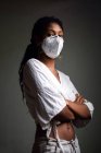 Young woman with a face mask — Stock Photo