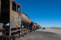 Old abandoned railway in the desert, travel place on background — Stock Photo