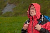 Man hiking in the rain in England — Stock Photo