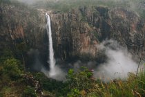 Wallaman Falls 268 meter drop on a foggy day, Queensland, Australia. — Stock Photo