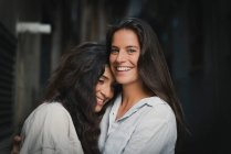 Beautiful esbian girls couple hug each other — Stock Photo