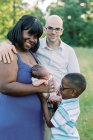 A family and their new baby — Stock Photo