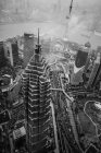 Breathtaking Aerial View above Jin Mao Tower in Shanghai, China surrounded by clouds HQ Circa 2018 — Stock Photo