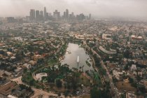 Echo Park in Los Angeles with View of Downtown Skyline and Foggy Polluted Smog Air in Big Urban City HQ — Stock Photo