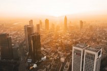 Incredible View of Frankfurt am Main, Germany Skyline in on Hazy Winter morning in Beautiful Sunrise Light HQ — Stock Photo
