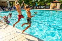 Children playing in a swimming pool. — Stock Photo