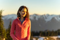 Sunset woman portrait at Olympic national park with dramatic backdrop — Stock Photo