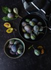 Fresh plums on the table — Stock Photo