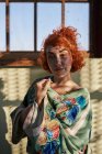 Young alternative redhead girl portrait with green kimono — Stock Photo