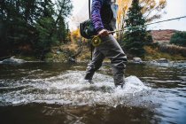 Midsection of woman fly fishing at Roaring Fork River — Stock Photo