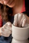 Young woman working on ceramics — Stock Photo