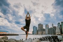 Young man dancer exercising in city — Stock Photo