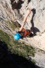 Young woman climbing through a via ferrata in Chulilla Canyon (Spain) — Stock Photo