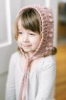 Little girl in a white dress and hat — Stock Photo