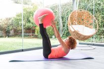 Girl doing gymnastics exercises in the fitness center of the park — Stock Photo