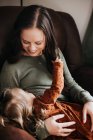 Beautiful young mother and her daughter — Stock Photo