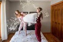 Two girls playing in bedroom at home — Stock Photo