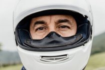 Portrait of a young  man in  a helmet — Stock Photo