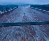 Ice Rushing By Bridges in Predawn Aerials — Foto stock