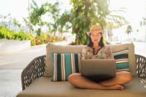Young beautiful woman with laptop — Stock Photo