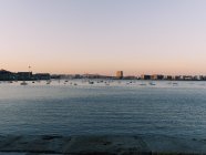 Sunset skyline view from Boston Harbor in Massachusetts — Stock Photo