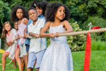 Tug of war with children — Stock Photo