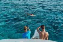 Surfers in Indian Ocean, Maldives — Stock Photo