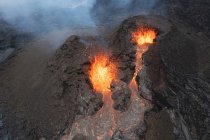Scenic aerial shot of blazing volcano — Stock Photo