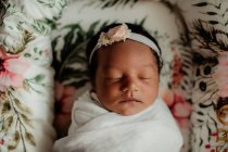 Little newborn baby sleeping in the bed — Stock Photo