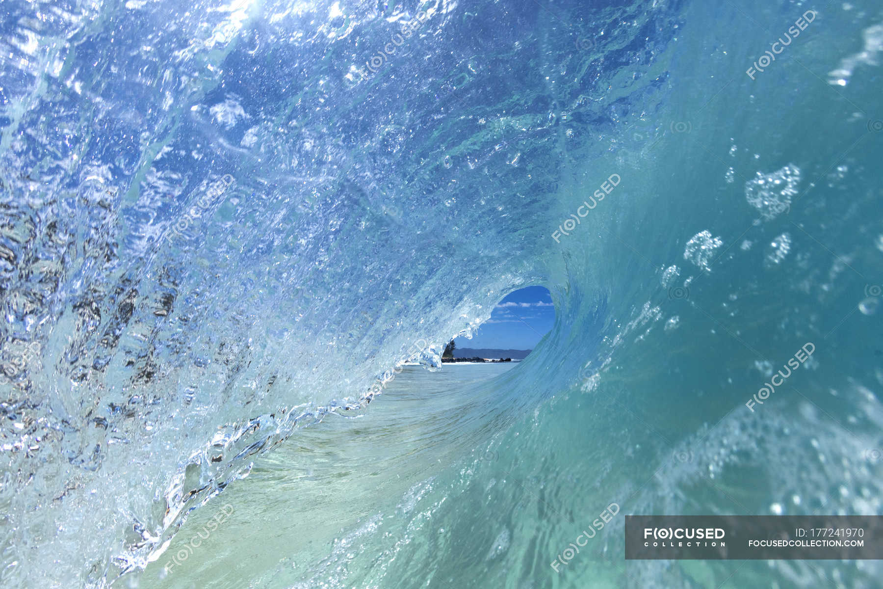 Inside View Of An Ocean Wave Tubing In Perfect Crystal Clear Water