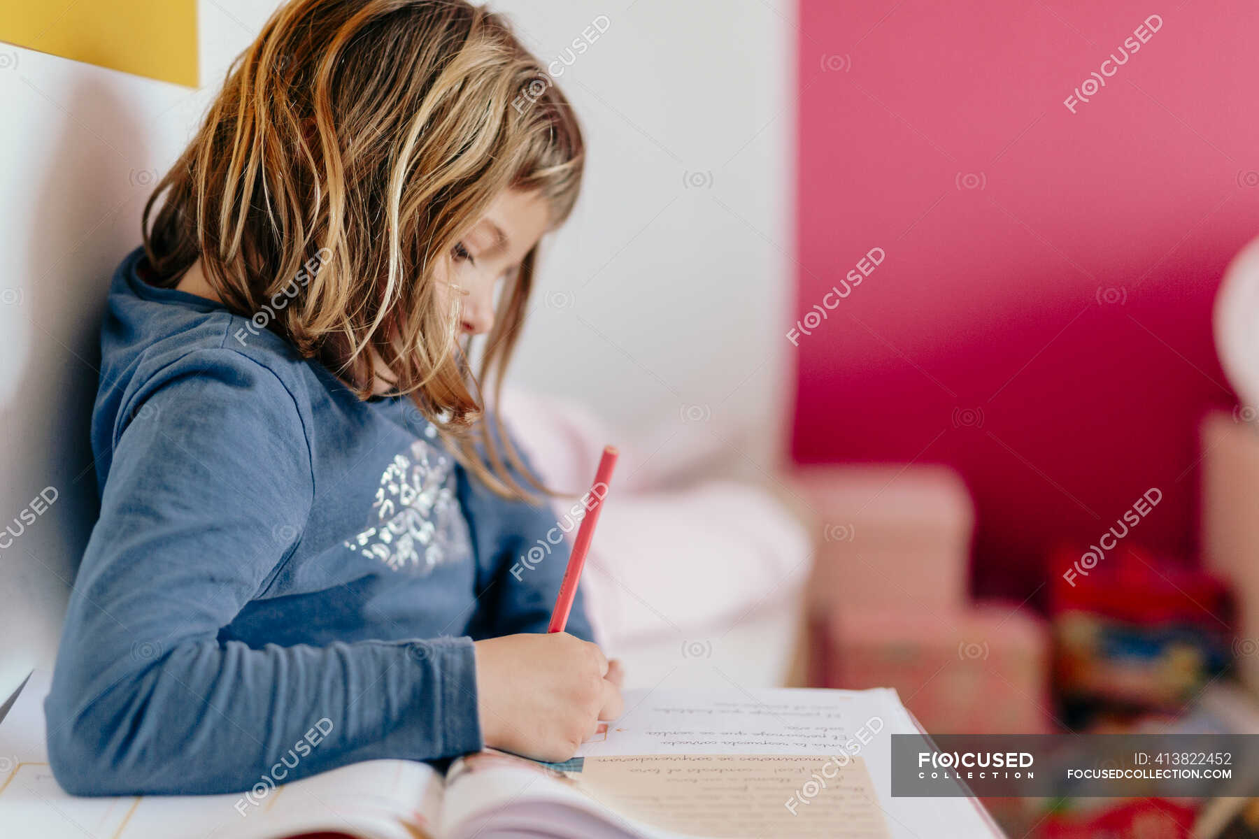 She doing her homework. Do one's homework.