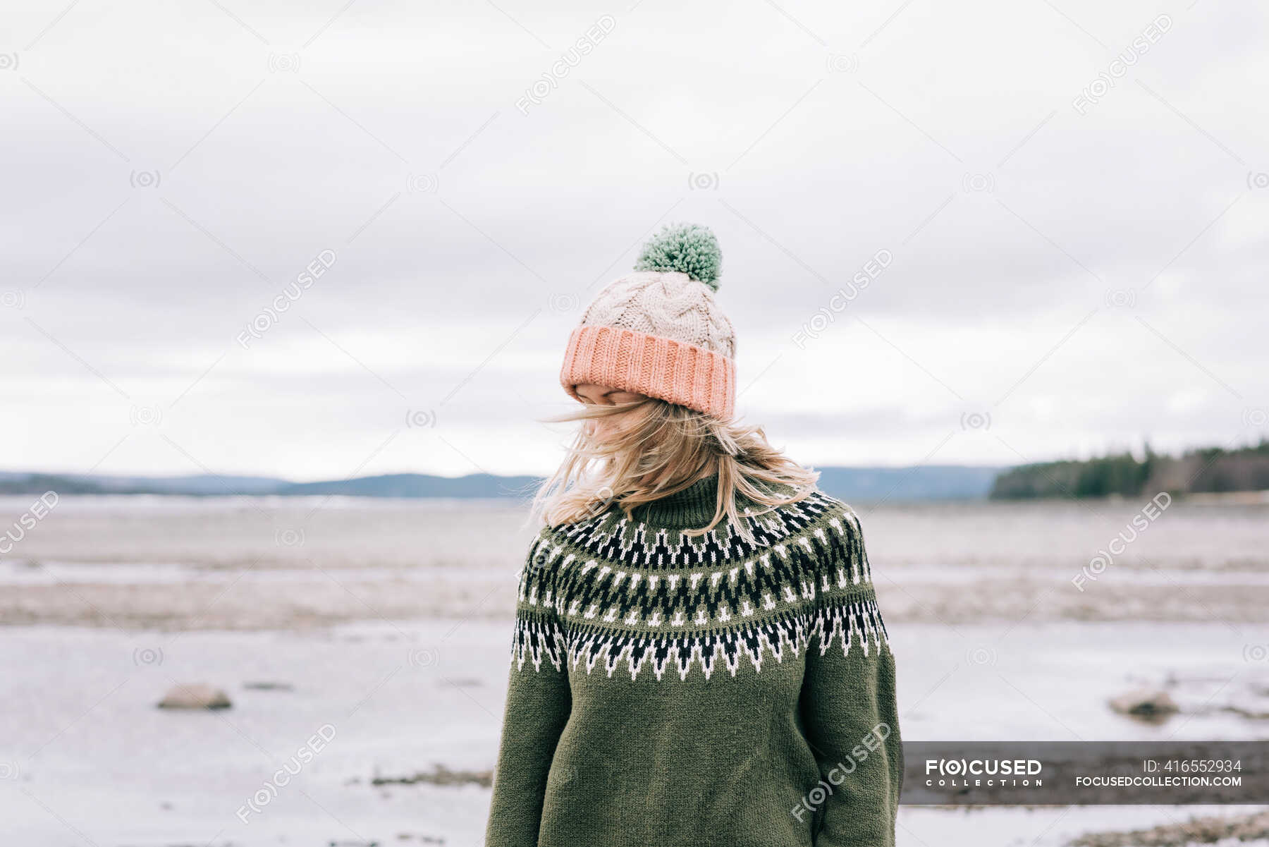 Portrait of woman standing with the wind blowing in her hair — freedom ...