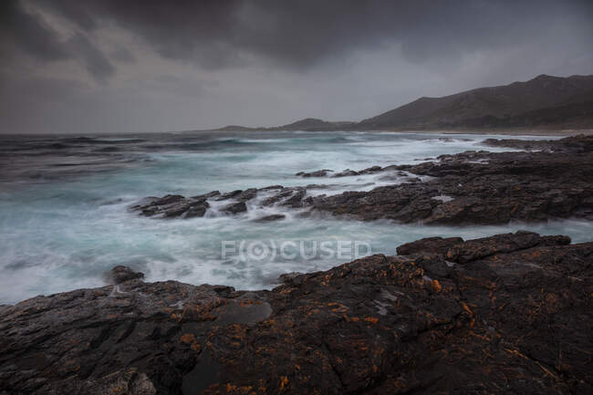 Galician coast during a stormy winter sunset — Stock Photo