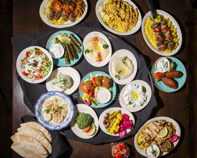 Above-view of a Meditterranean feast spread out on a table — Stock Photo