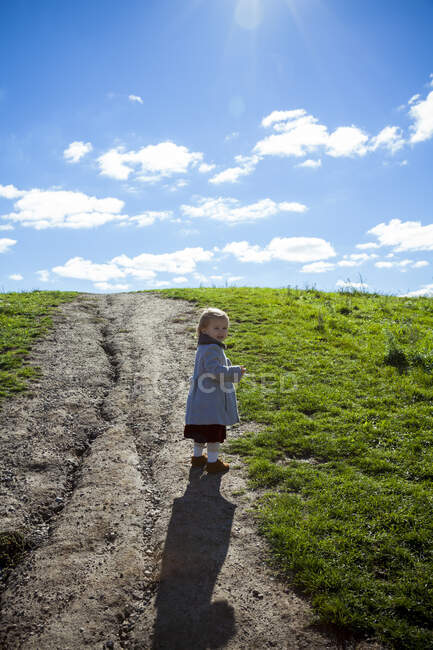 Young stylish girl looking back on pathway in Detroit MI — Stock Photo